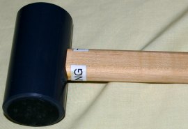 plastic headed hammer with rubber pad on one end